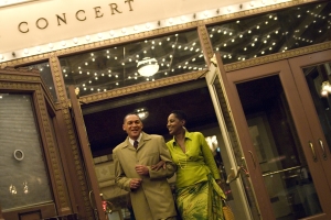 African American couple leaving concert hall